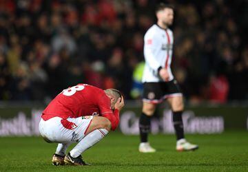Elliot Lee reacts after match between Wrexham and Sheffield United at the Racecourse Ground Stadium.