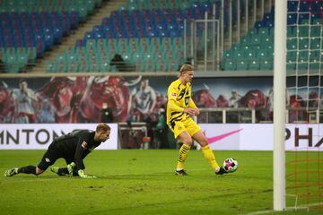 Dortmund's Norwegian forward Erling Braut Haaland scores his team's third goal during the German first division Bundesliga football match RB Leipzig vs Borussia Dortmund in Leipzig, on January 9, 2021. (Photo by RONNY HARTMANN / various sources / AFP) / D
