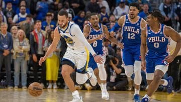 Golden State Warriors guard Stephen Curry (30) starts a fast break against Philadelphia 76ers guard Tyrese Maxey (0) during the fourth quarter at Chase Center.