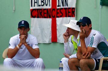 England captain Alastair Cook (right) watches on as the tourists fall to defeat.