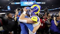 DETROIT, MICHIGAN - JANUARY 14: Matthew Stafford #9 of the Los Angeles Rams hugs Jared Goff #16 of the Detroit Lions following the game in the NFC Wild Card Playoffs at Ford Field on January 14, 2024 in Detroit, Michigan. Detroit defeated Los Angeles 24-23.   Gregory Shamus/Getty Images/AFP (Photo by Gregory Shamus / GETTY IMAGES NORTH AMERICA / Getty Images via AFP)