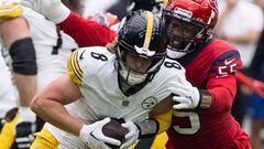 Oct 1, 2023; Houston, Texas, USA; Pittsburgh Steelers quarterback Kenny Pickett (8) is sacked by Houston Texans defensive end Jerry Hughes (55) in the first quarter at NRG Stadium. Mandatory Credit: Thomas Shea-USA TODAY Sports