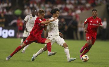 Real Madrid forward Takefusa Kubo in action against Bayern Munich.