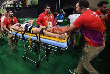 France's Samir Ait Said is stretchered off in the wake of his injury.