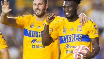 Tigres' Jordy Caicedo (R) celebrates with teammates after scoring against Queretaro during their Mexican Apertura 2022 tournament football match at Universitario stadium in Monterrey, Mexico on July 30, 2022. (Photo by Julio Cesar AGUILAR / AFP)