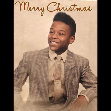 Floyd Mayweather wishes his fans a Merry Christmas with a photo of himself as a youngster.