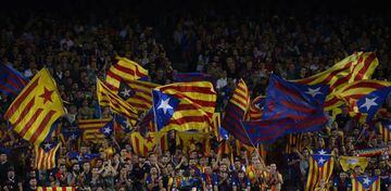 Barcelona's fans wave 'Esteladas' (pro-independence Catalan flags) before the UEFA Champions League Group D football match FC Barcelona vs Juventus at the Camp Nou stadium in Barcelona on September 12, 2017