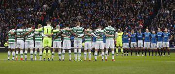 Britain Football Soccer - Rangers v Celtic - Scottish Premiership - Ibrox Stadium - 31/12/16 Celtic and Rangers players observe a minutes silence in respect of the 1971 Ibrox disaster