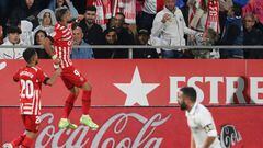 Girona's Argentinian forward Taty Castellanos (2L) celebrates his fourth goal during the Spanish league football match between Girona FC and Real Madrid CF at the Montilivi stadium in Girona on April 25, 2023. (Photo by LLUIS GENE / AFP)