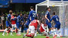 Arsenal's Brazilian defender Gabriel Magalhaes scores his team's first goal during the English Premier League football match between Chelsea and Arsenal at Stamford Bridge in London on November 6, 2022. (Photo by Glyn KIRK / AFP) / RESTRICTED TO EDITORIAL USE. No use with unauthorized audio, video, data, fixture lists, club/league logos or 'live' services. Online in-match use limited to 120 images. An additional 40 images may be used in extra time. No video emulation. Social media in-match use limited to 120 images. An additional 40 images may be used in extra time. No use in betting publications, games or single club/league/player publications. / 