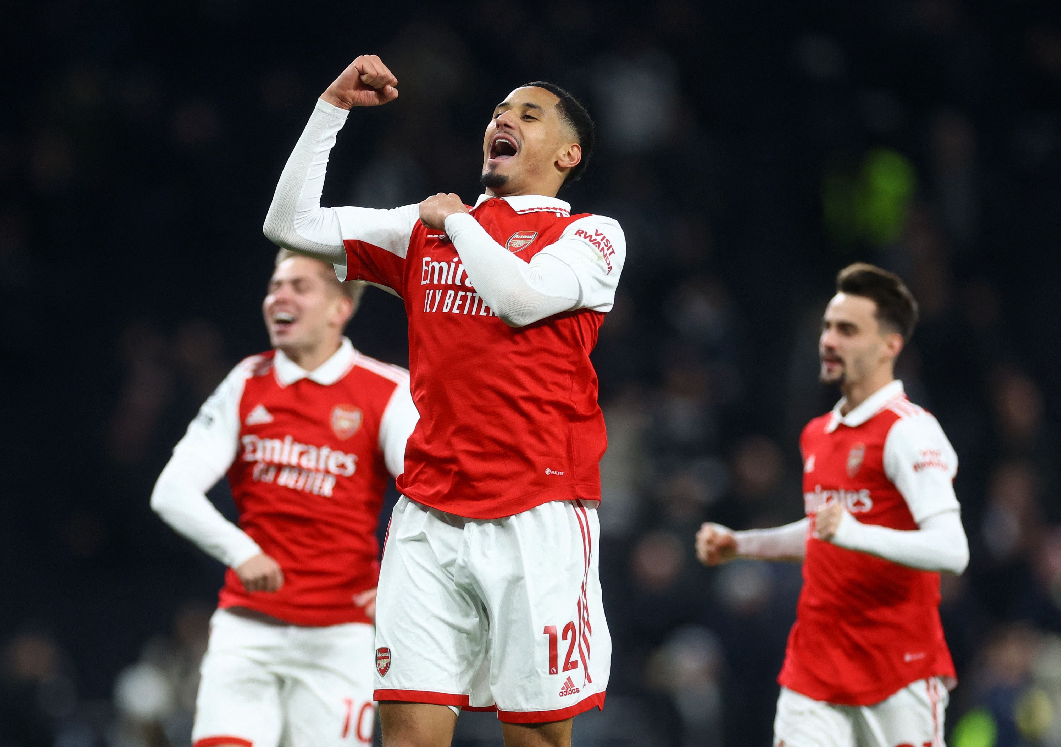 Soccer Football - Premier League - Tottenham Hotspur v Arsenal - Tottenham Hotspur Stadium, London, Britain - January 15, 2023 Arsenal's William Saliba celebrates after the match Action Images via Reuters/Paul Childs EDITORIAL USE ONLY. No use with unauthorized audio, video, data, fixture lists, club/league logos or 'live' services. Online in-match use limited to 75 images, no video emulation. No use in betting, games or single club /league/player publications.  Please contact your account representative for further details.