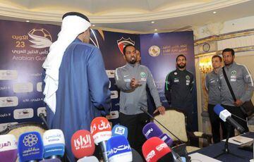 A photo provided by the Kuwaiti news agency KUNA on December 21, 2017 shows staff members of the Saudi national football team walking way from a press conference in Kuwait City, including the team's Saudi midfielder Ahmed Al-Fraidi (3rd-R).