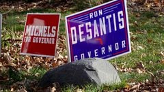 MUSKEGO, WISCONSIN - NOVEMBER 06: Signs supporting Wisconsin Republican gubernatorial candidate Tim Michels and Florida Governor Ron Desantis sit in the yard in front of a home before a visit from Michels at a nearby bar on November 6, 2022 in Muskego, Wisconsin. Michels is in a close race with incumbent Democrat Gov. Tony Evers ahead of Tuesday's general election.  (Photo by Scott Olson/Getty Images)