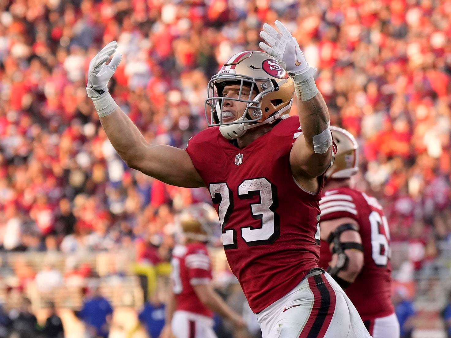 Christian McCaffrey and the 49ers win 13th straight in the regular