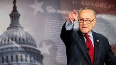 Senate Majority Leader Chuck Schumer (D-NY) gestures as he holds a news conference at the US Capitol in Washington.