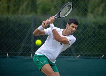 Serbia's Novak Djokovic practices on the Aorangi Practice Courts at The All England Tennis Club in Wimbledon, south-west London, on June 27, 2021, ahead of the start of the 2021 Wimbledon Championships tennis tournament. (Photo by AELTC/David Gray / POOL 