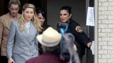 Actor Amber Heard leaves the Fairfax County Circuit Courthouse following her ex-husband Johnny Depp's defamation case against her.