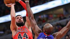 CHICAGO, IL - JANUARY 13: Nikola Mirotic #44 of the Chicago Bulls shoots over Anthony Tolliver #43 of the Detroit Pistons at the United Center on January 13, 2018 in Chicago, Illinois. The Bulls defeated the Pistons 107-105. NOTE TO USER: User expressly a