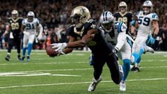 NEW ORLEANS, LA - JANUARY 07: Michael Thomas #13 of the New Orleans Saints catches a pass over James Bradberry #24 of the Carolina Panthers during the first half of the NFC Wild Card playoff game at the Mercedes-Benz Superdome on January 7, 2018 in New Or