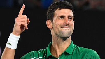 Novak Djokovic celebrating after beating Roger Federer at the Australian Open. 