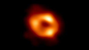 This is the first image of Sagittarius A* (or Sgr A* for short), the supermassive black hole at the center of our galaxy. It was captured by the Event Horizon Telescope (EHT), an array which linked together radio observatories across the planet to form a single "Earth-sized" virtual telescope. The new view captures light bent by the powerful gravity of the black hole, which is four million times more massive than our Sun.