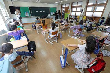 Students practice social distancing amid the coronavirus disease (COVID-19) outbreak at an elementary school in Daejeon, South Korea, May