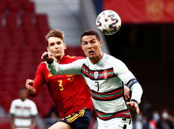 Portugal's Cristiano Ronaldo in action with Spain's Diego Llorente.