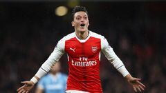 LONDON, ENGLAND - DECEMBER 10:  Mesut Ozil of Arsenal celebrates scoring his sides second goal during the Premier League match between Arsenal and Stoke City at the Emirates Stadium on December 10, 2016 in London, England.  (Photo by Julian Finney/Getty I