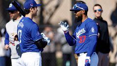 GLENDALE, ARIZONA - FEBRUARY 14: Shohei Ohtani #17 of the Los Angeles Dodgers talks with Teoscar Hern�ndez #37 during workouts at Camelback Ranch on February 14, 2024 in Glendale, Arizona.   Chris Coduto/Getty Images/AFP (Photo by Chris Coduto / GETTY IMAGES NORTH AMERICA / Getty Images via AFP)