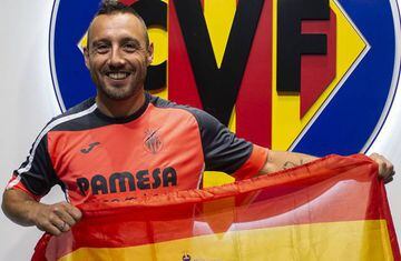 Cazorla poses with the Spain flag following his recall to La Roja's squad.