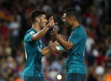 Real Madrid’s Marco Asensio gets a "well done son" nod from Casemiro.