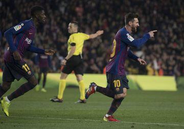 A familiar sight in LaLiga - Messi wheels away after scoring