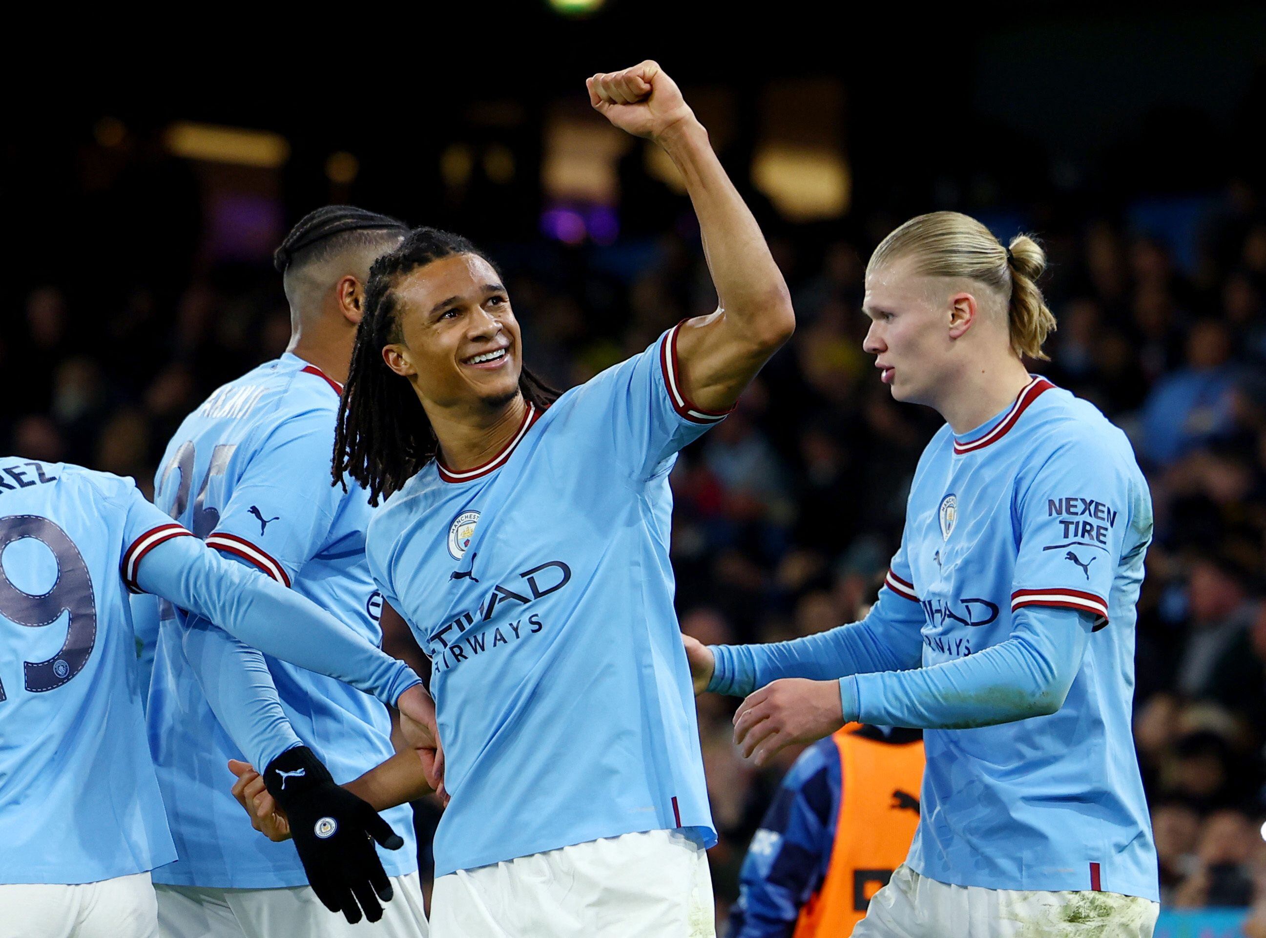 Soccer Football - FA Cup - Fourth Round - Manchester City v Arsenal - Etihad Stadium, Manchester, Britain - January 27, 2023 Manchester City's Nathan Ake celebrates scoring their first goal with teammates REUTERS/Molly Darlington