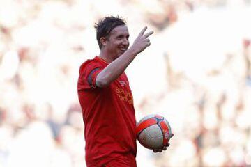 Liverpool's Robbie Fowler as he steps up to take a penalty at the Kop end.