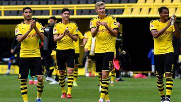 Dortmund&#039;s Norwegian forward Erling Braut Haaland (C) celebrates with his teammates their victory 4:0 after the German first division Bundesliga football match BVB Borussia Dortmund v Schalke 04 on May 16, 2020 in Dortmund, western Germany as the sea