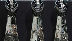 Three Vince Lombardi Trophies from Las Vegas Raiders championship wins in Super Bowls XI, XV and XVIII.