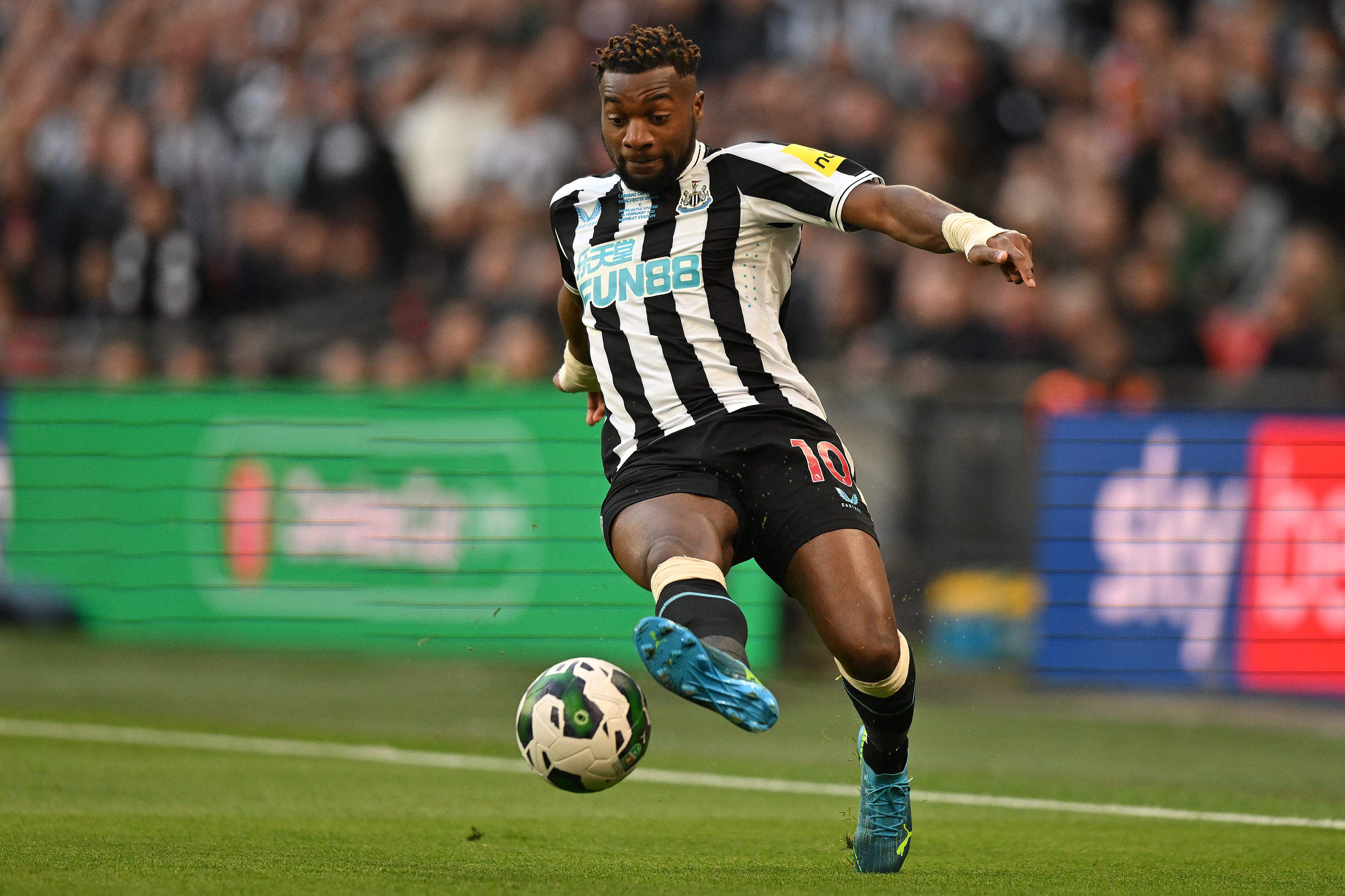 Newcastle United's French midfielder Allan Saint-Maximin controls the ball during the English League Cup final football match between Manchester United and Newcastle United at Wembley Stadium, north-west London on February 26, 2023. (Photo by Glyn KIRK / AFP) / RESTRICTED TO EDITORIAL USE. No use with unauthorized audio, video, data, fixture lists, club/league logos or 'live' services. Online in-match use limited to 120 images. An additional 40 images may be used in extra time. No video emulation. Social media in-match use limited to 120 images. An additional 40 images may be used in extra time. No use in betting publications, games or single club/league/player publications. / 
