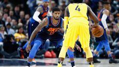 INDIANAPOLIS, IN - DECEMBER 13: Paul George #13 of the Oklahoma City Thunder defends Victor Oladipo #4 of Indiana Pacers during the game at Bankers Life Fieldhouse on December 13, 2017 in Indianapolis, Indiana. NOTE TO USER: User expressly acknowledges an