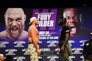 Boxers Deontay Wilder and Tyson Fury attend a press conference on June 15, 2021, in Los Angeles, California to announce their third WBC heavyweight championship fight scheduled for July 24 in Las Vegas. (Photo by FREDERIC J. BROWN / AFP)