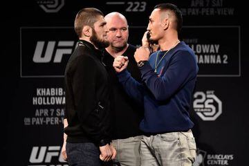 Nurmagomedov (left) and Holloway (right) are to face off for McGregor's lightweight title.