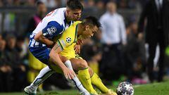 FC Porto's Portuguese defender Fabio Cardoso (L) vies with Inter Milan's Argentinian forward Lautaro Martinez during the UEFA Champions League last 16 second leg football match between FC Porto and Inter Milan at the Dragao stadium in Porto on March 14, 2023. (Photo by MIGUEL RIOPA / AFP)
