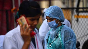 Doctors are seen during a Covid-19 Coronavirus screening at a quarantine centre, in Nashik on September 13, 2020.