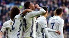 Real Madrid&#039;s Brazilian midfielder Casemiro (2ndL) celebrates with his teammates after scoring during the Spanish league football match Real Madrid CF vs Granada FC at the Santiago Bernabeu stadium in Madrid on January 7, 2017.