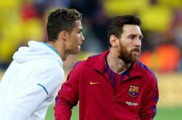 FILE PHOTO: FC Barcelona v Real Madrid - Camp Nou, Barcelona, Spain - May 6, 2018 - Real Madrid's Cristiano Ronaldo with Barcelona's Lionel Messi before the match