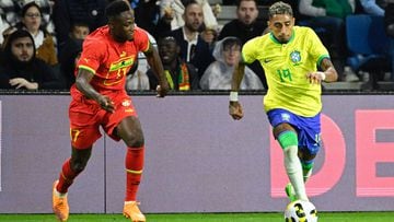 Brazil's defender Raphinha (R) fights for the ball with Ghana�s defender Bab Rahman during the friendly football match between Brazil and Ghana at the Oceane Stadium in Le Havre, northwestern France on September 23, 2022. (Photo by Damien MEYER / AFP)