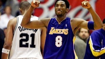 FILE PHOTO: ON THIS DAY -- May 21  May 21, 2001     BASKETBALL - Los Angeles Lakers guard Kobe Bryant celebrates while San Antonio Spurs forward Tim Duncan walks off disconsolately during Game 2 of the Western Conference Finals at the Alamodome in San Antonio.     Duncan's monster 40-point game went in vain as Bryant added 28 points of his own to lead Los Angeles to an 88-81 victory and a 2-0 lead in the series.     The Lakers went on to sweep San Antonio before defeating Philadelphia 76ers 4-1 in the NBA Finals to seal their second straight championship.  REUTERS/Andess Latif/File photo