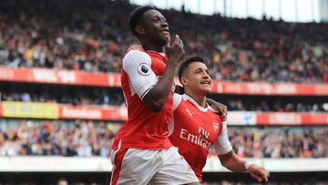 LONDON, ENGLAND - MAY 07:  Danny Welbeck of Arsenal celebrates scoring his sides second goal with Alexis Sanchez of Arsenal during the Premier League match between Arsenal and Manchester United at the Emirates Stadium on May 7, 2017 in London, England.  (