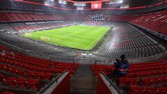 08 December 2021, Bavaria, Munich: Football: Champions League, Bayern Munich - FC Barcelona, Group Stage, Group E, Matchday 6, Allianz Arena. The stands for the spectators are empty before the match. Only one photographer is waiting for the game to start. Photo: Sven Hoppe/dpa (Photo by Sven Hoppe/picture alliance via Getty Images)