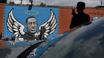 Mourners photograph a mural of George Floyd, whose death in Minneapolis police custody has sparked nationwide protests against racial inequality, in Houston, Texas, U.S. June 8, 2020.  REUTERS/Callaghan O&#039;Hare