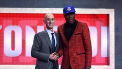 NEW YORK, NEW YORK - JUNE 20: Sekou Doumbouya poses with NBA Commissioner Adam Silver after being drafted with the 15th overall pick by the Detroit Pistons during the 2019 NBA Draft at the Barclays Center on June 20, 2019 in the Brooklyn borough of New Yo